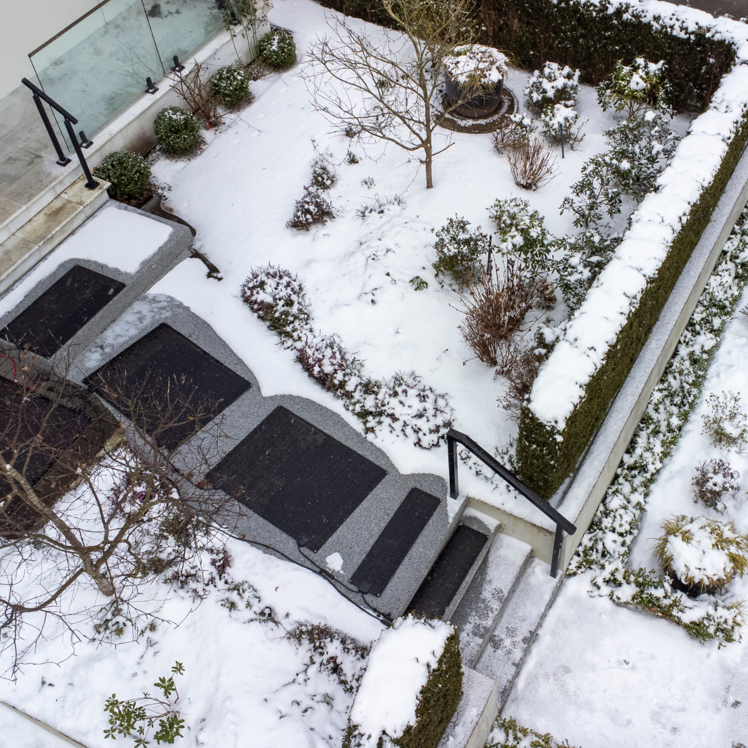 hot step snow melting mat installed on residential walkway